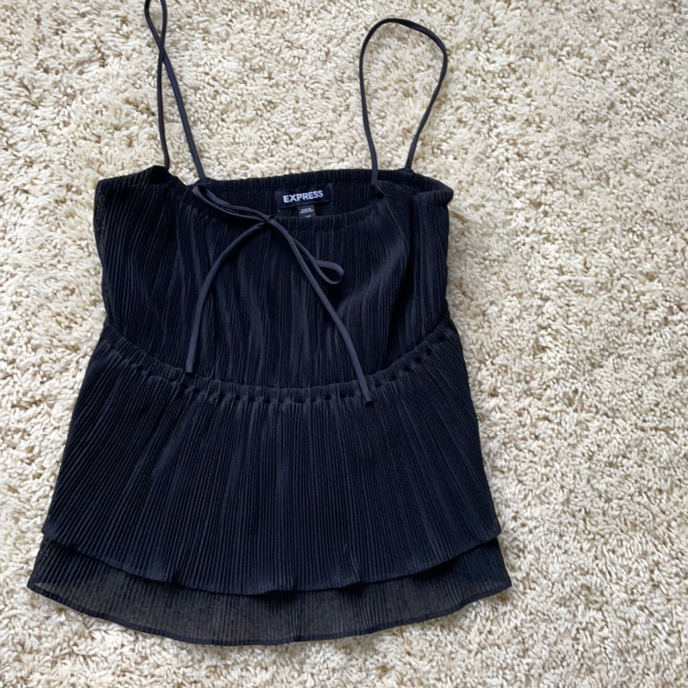 Express top with cute detail